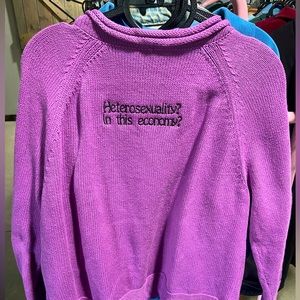 Medium cardigan with “Heterosexuality in this economy?” Embroidered on the back